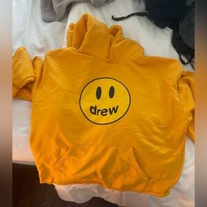 Drew House Golden Hoodie with Iconic Logo